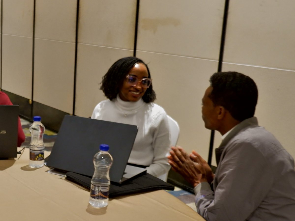 Sophie Mwinyi (left) at the MalariaGEN-PAMCA hackathon. Sophie Mwinyi at the MalariaGEN-PAMCA hackathon.